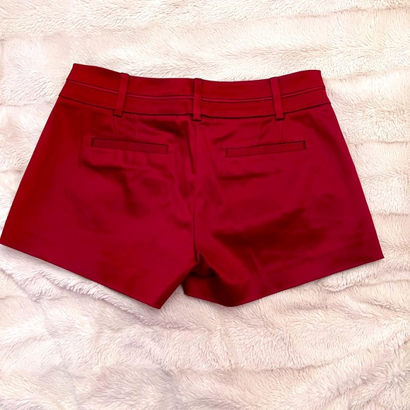 Bright red satin shorts. - Picture 2 of 2
